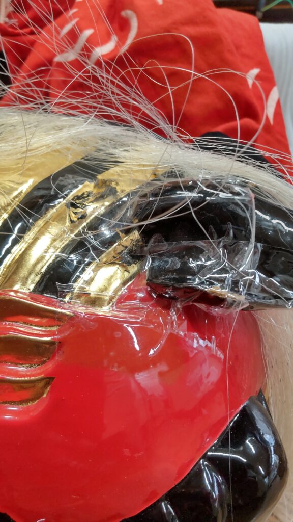 獅子頭の耳の修理の画像