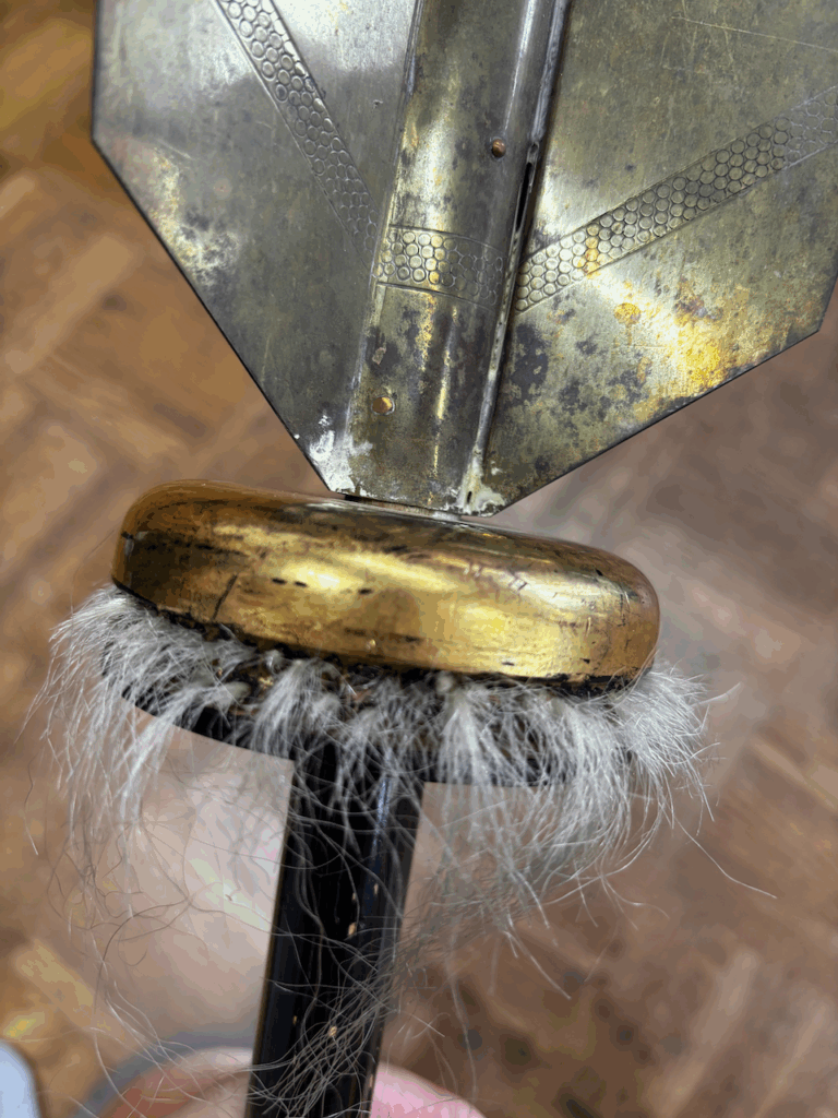 警固祭りの矢の修理の画像